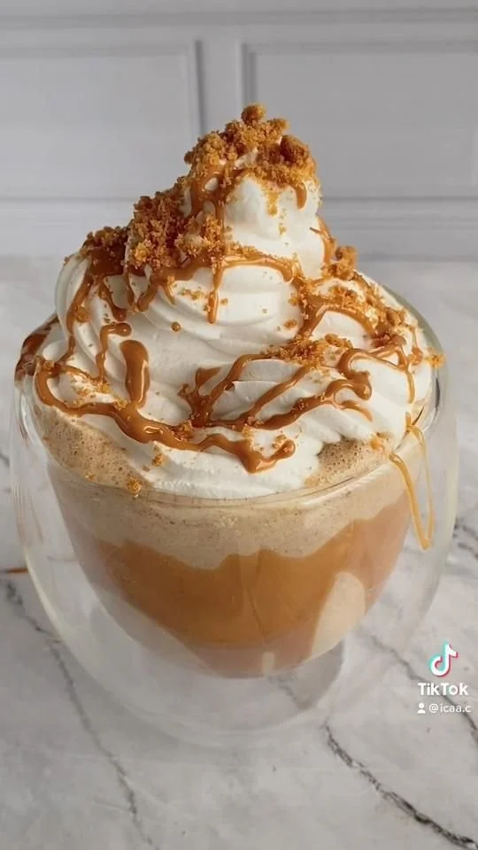 Delicious Lotus Biscoff milkshake topped with crushed cookies and whipped cream
