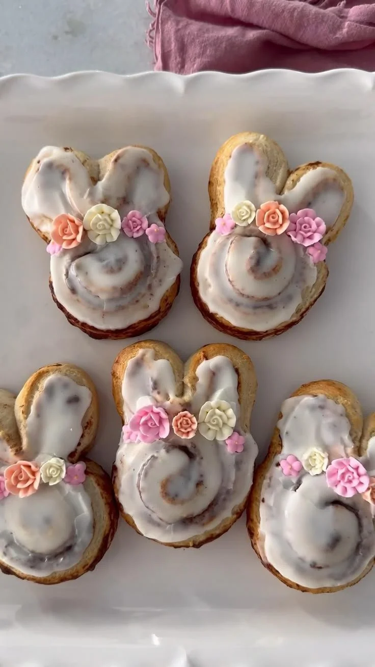Easter Bunny Cinnamon Rolls decorated with icing and festive colors