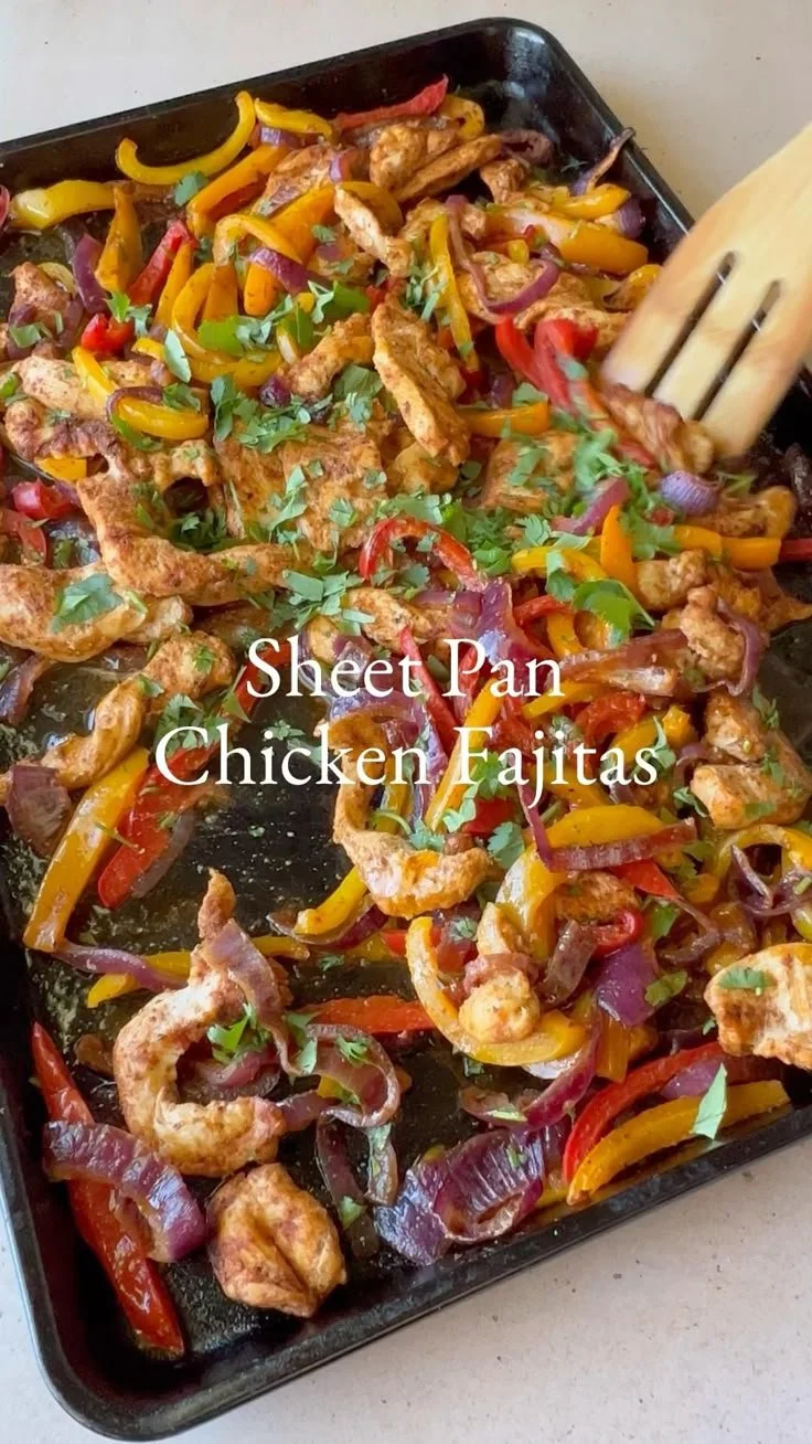 Sheet pan chicken fajitas with colorful peppers and onions