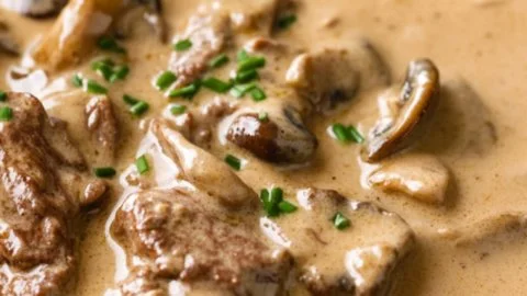 Gordon Ramsay's Beef Stroganoff, a delicious creamy beef dish served over pasta.