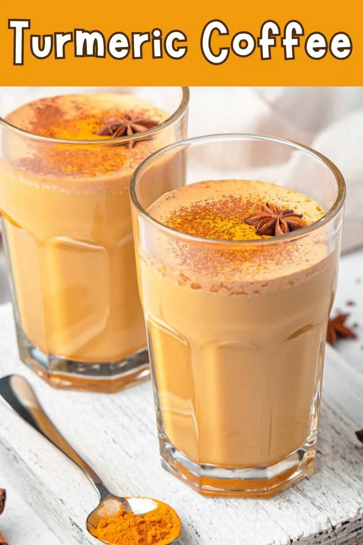 A cup of turmeric coffee with spices, showcasing its vibrant color and health benefits.